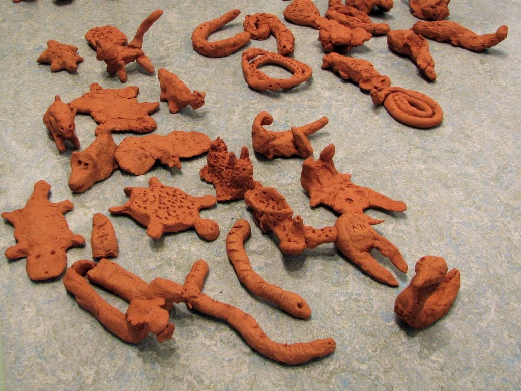 Small animals made of red clay and baked in ceramic oven.